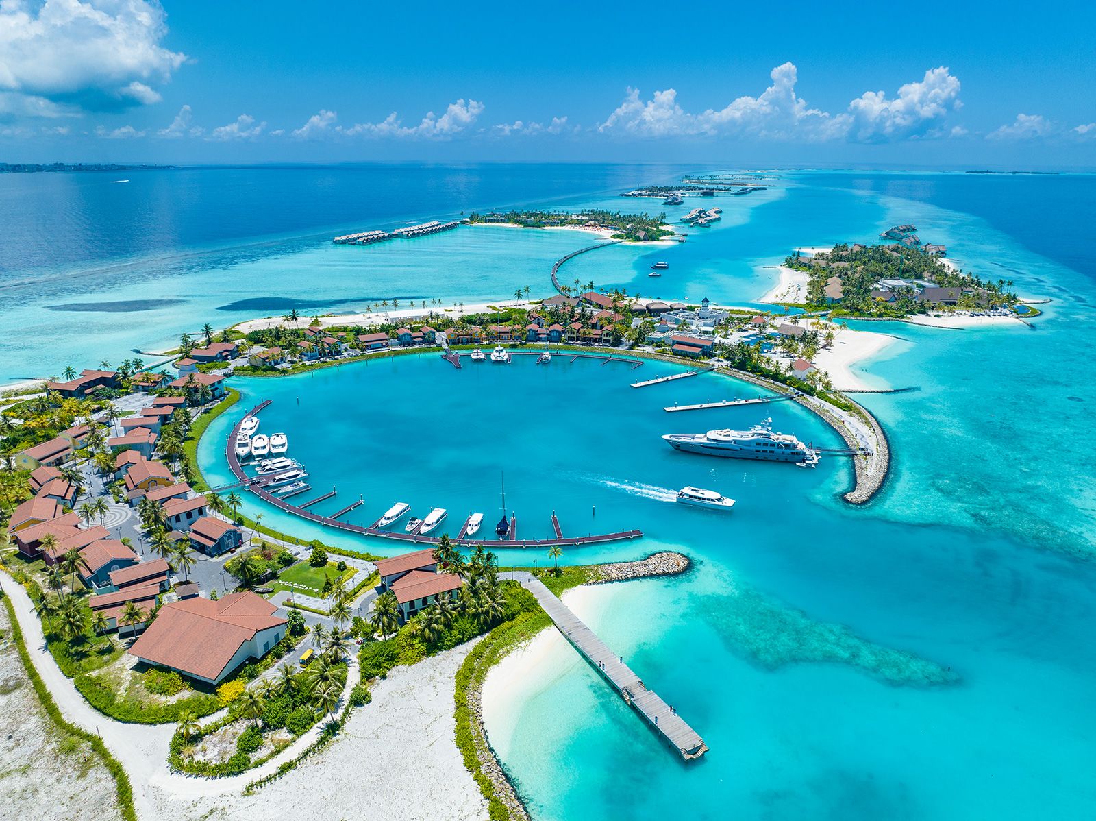 230516112548-01-crossroads-maldives-aerial